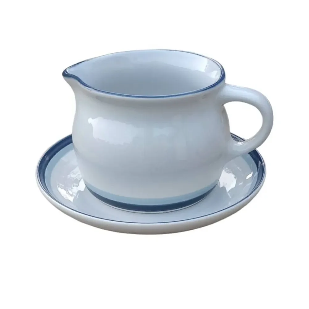 Pfaltzgraff gravy boat and base plate, pattern is sky